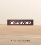 Le texte indique « DÉCOUVREZ » et « *Test instrumental » sur une surface en bois ou de couleur claire avec un design minimaliste.