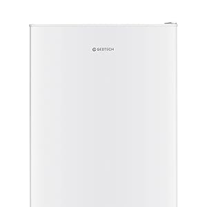 au design épuré et minimaliste, avec congélateur supérieur et compartiment inférieur pour aliments frais