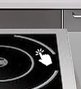 une plaque de cuisson blanche avec le symbole d'une main blanche dessus.