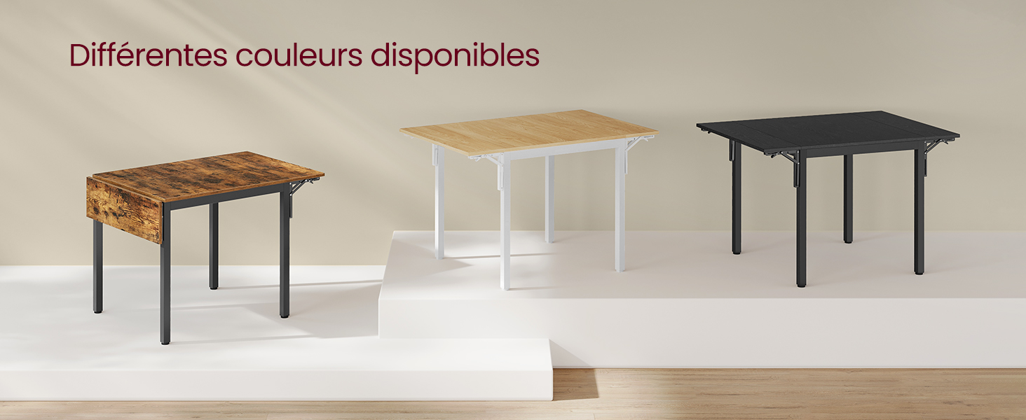 Trois tables à manger modernes disposées côte à côte, présentant différentes options de couleurs : bois brun rustique, finitions blanches et noires avec pieds en métal.