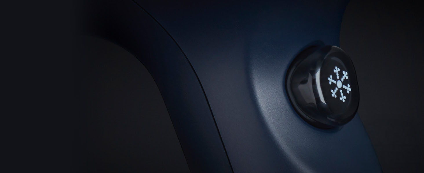 Image sombre en gros plan de ce qui semble faire partie de l'intérieur d'un véhicule ou d'un composant mécanique.