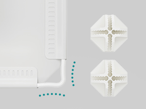 Évent de plafond blanc ou diffuseur d'air installé dans un plafond blanc, démontrant le composant du système de ventilation.