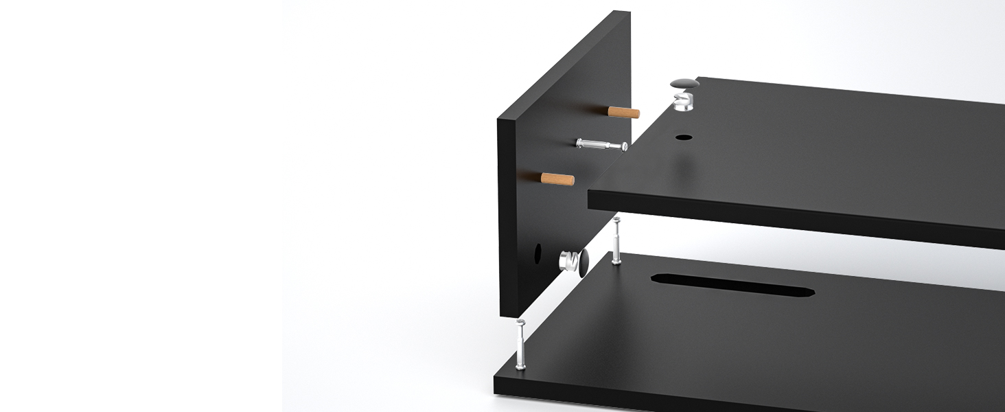 Gros plan d'un joint ou d'un connecteur de meuble noir. Montre une épingle métallique insérée dans un trou pré-percé d'une planche de bois de couleur foncée