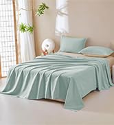 vert menthe comprenant un couvre-lit matelassé et des taies d'oreiller assorties disposées sur un lit, présentant un motif