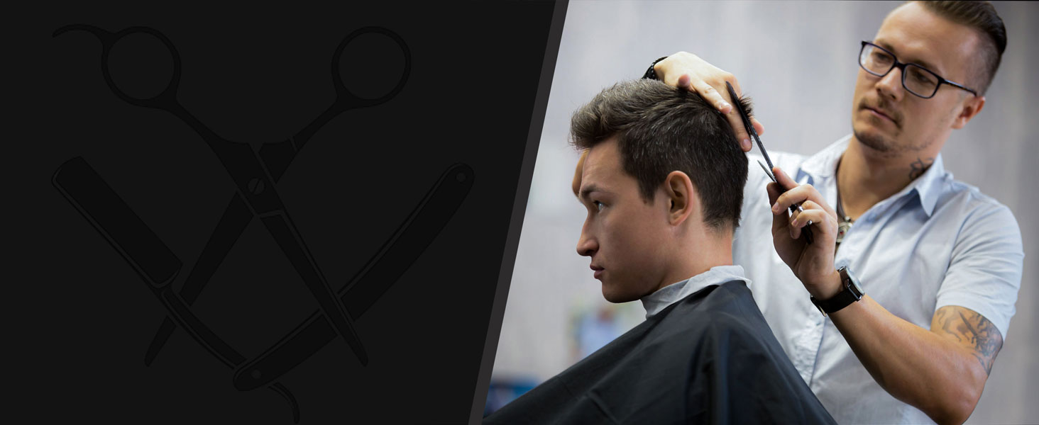 un homme se fait couper les cheveux chez un coiffeur