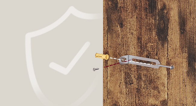 Gros plan d'un ancrage mural blanc ou d'un support de montage fixé à une surface en bois, montrant le matériel d'installation