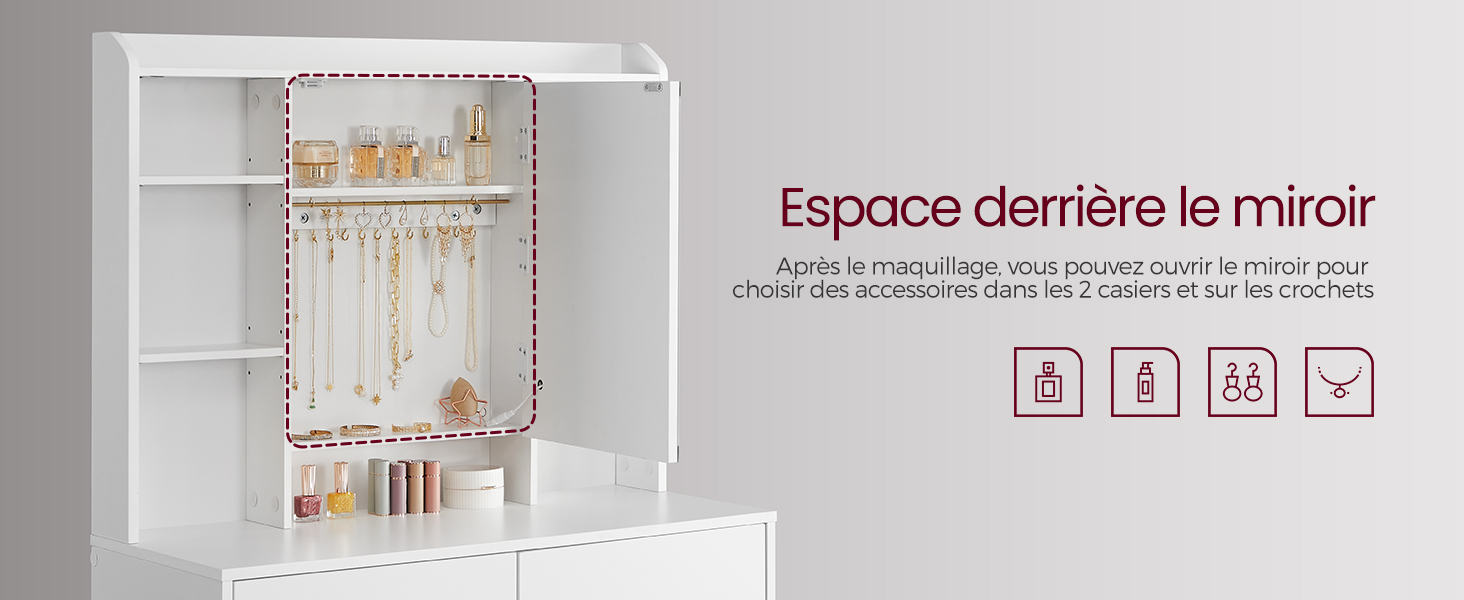 L'armoire à glace est en bois blanc et comporte une ligne rouge sur le dessus.