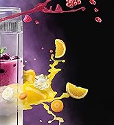 un mixeur avec un smoothie et des fruits