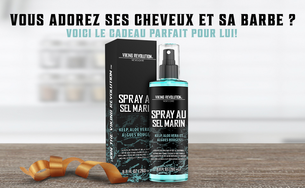 dans une boîte noire avec un flacon pulvérisateur bleu, avec un texte en français sur le cadeau parfait pour les amoureux des cheveux et de la barbe.