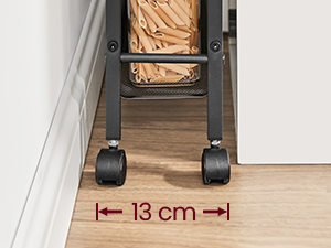 Gros plan d'un pied de meuble à roulettes sur un plancher en bois. Une flèche rouge et du texte indiquent une mesure de 13 cm entre le pied et le mur.