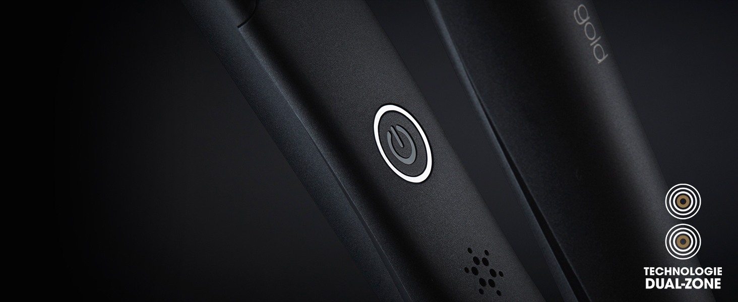 Gros plan d'un tissu ou d'un matériau noir avec un bouton circulaire ou un élément d'interface visible.