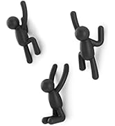 Trois crochets muraux décoratifs noirs en forme de personnages grimpants, conçus pour suspendre des objets.