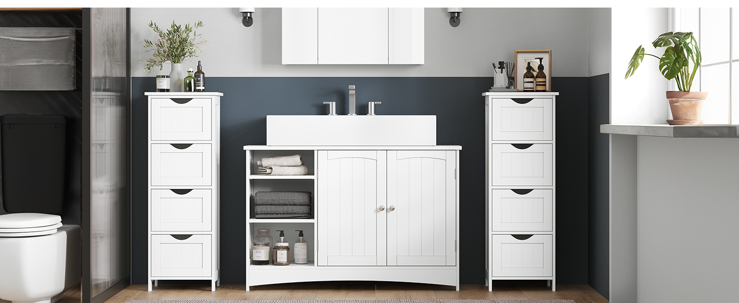 avec lavabo, armoire et deux tours de rangement. Mur d'accent foncé et plante en pot visibles.