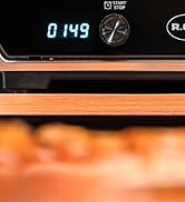 Le texte indique « 0,149 ». Affichage numérique affichant la lecture numérique sur fond noir avec certaines interfaces de commande visibles.